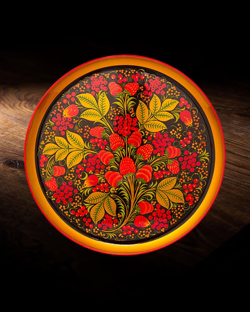 Khokhloma berry field decorative plate